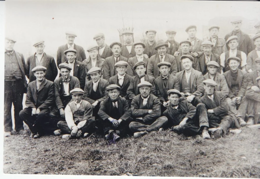 Photograph of a group of construction workers at the new Chadderton Power Station, c.1923.
Image reference: P30532