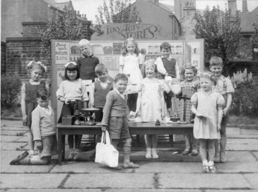 Photograph of the Tiny Tots Store run by school children at Brideoake Street School, Waterhead, Oldham, 1951.
Image reference: P62334